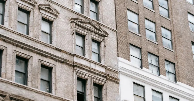 Close-up view of modern urban building facades showcasing architectural design and detail.